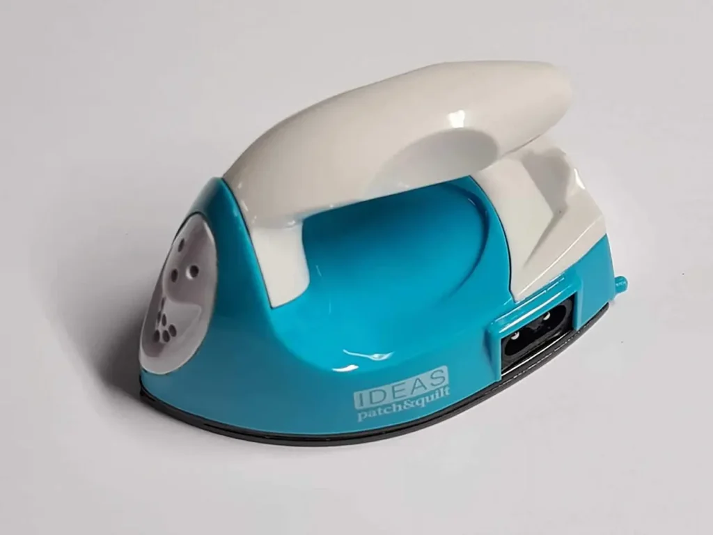 Plancha mini sin vapor con suela anti-adherente